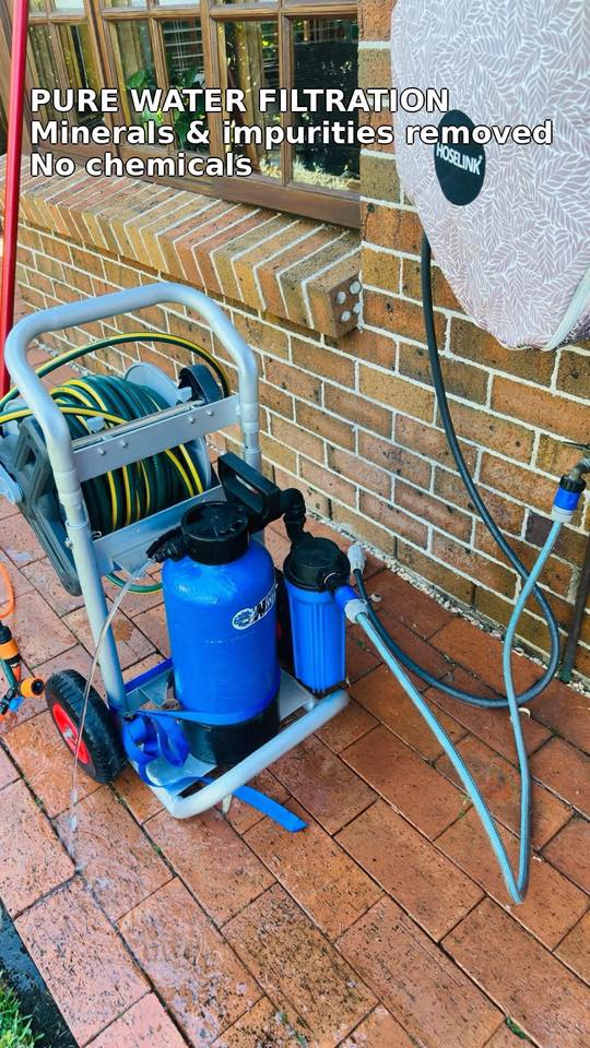 A bead of pure water on spotless glass